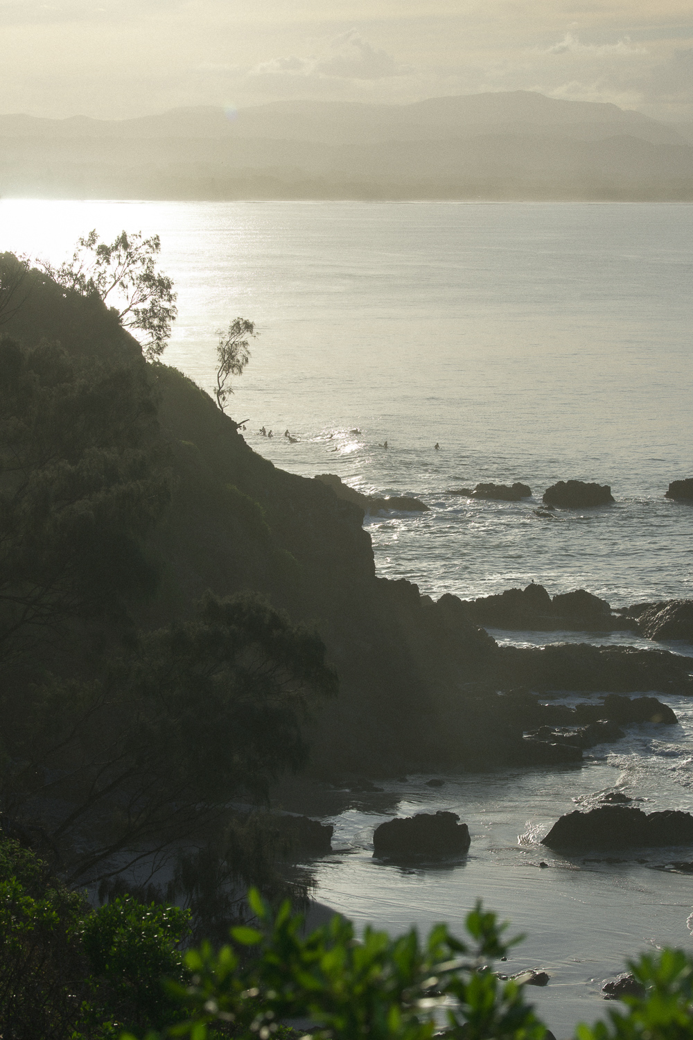 Surfers During Sunset